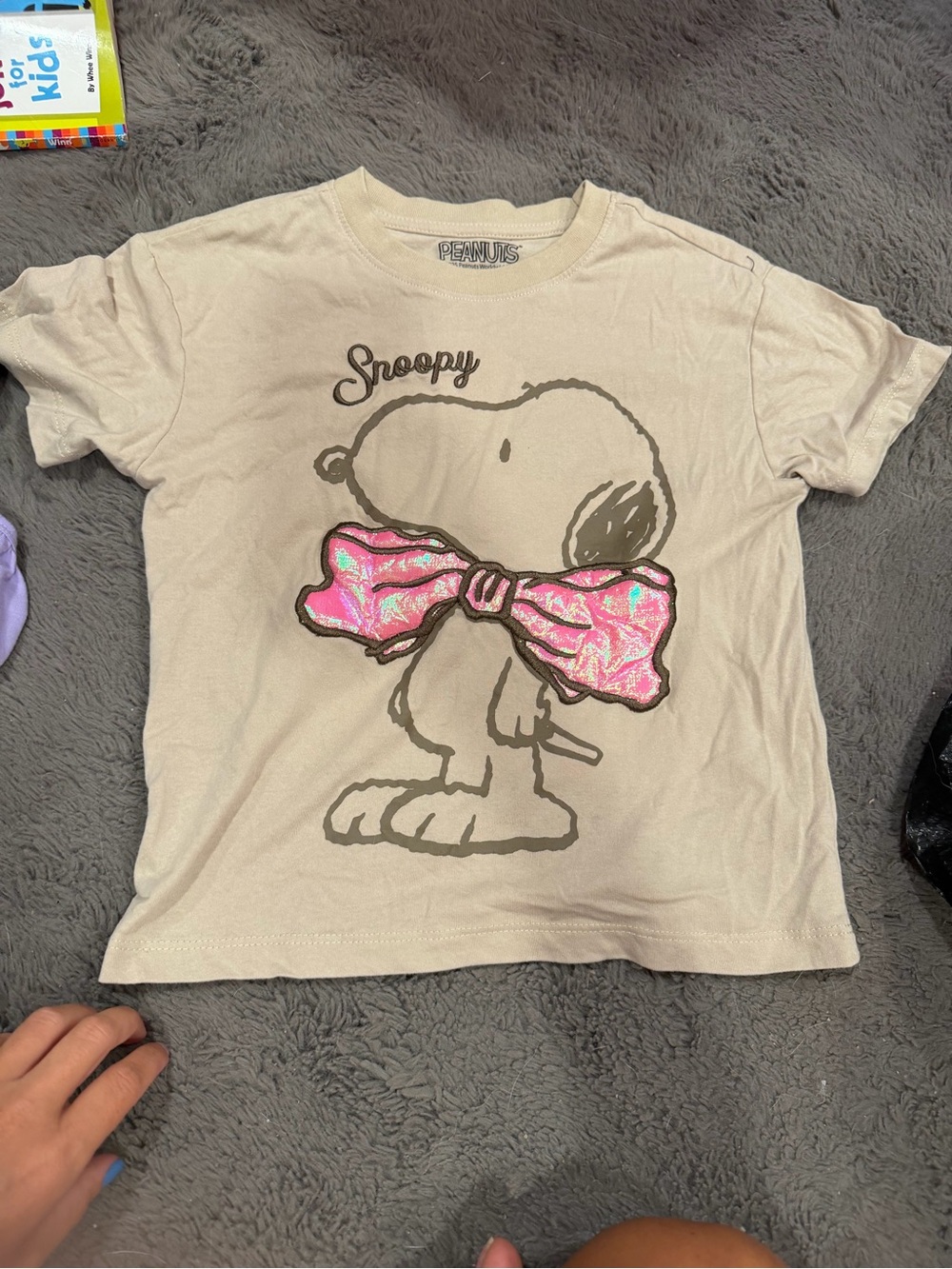 Peanuts Beige Snoopy Tee with Pink Iridescent Bow